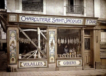 Woman in the Window of a Butcher